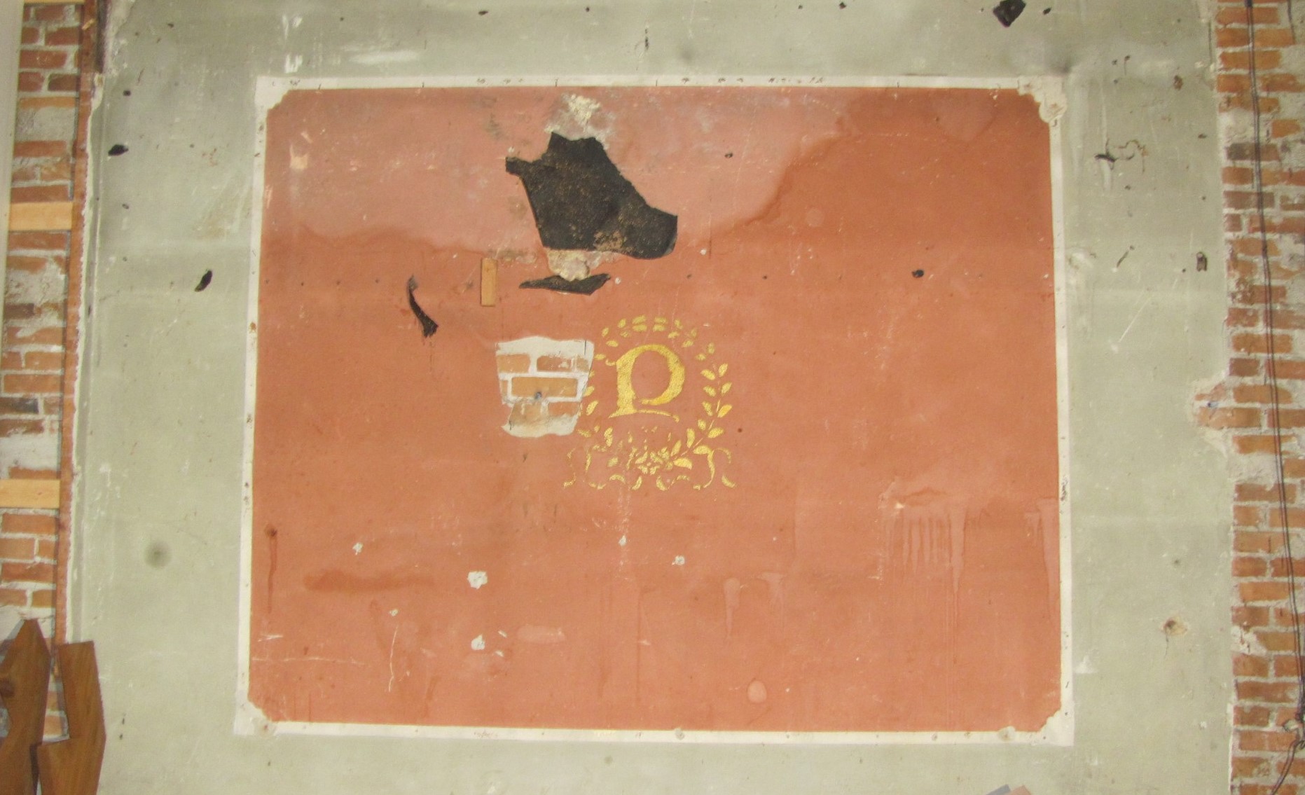 One of the Paramount Theatre's old plaster logos, uncovered during a 2022 remodel. (Courtesy Okanogan County Historical Society)