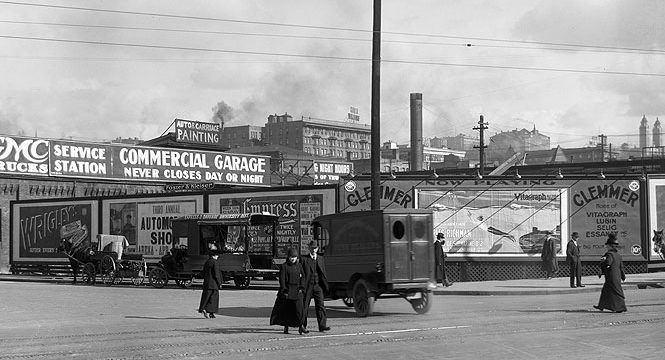 Billboard advertising at Westlake and Olive in Seattle, 1916. (Courtesy Washington State History Museum, Catalog ID 1943.42.33391)