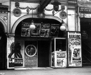 Postering gone wild at Seattle's Tivoli Theatre, ca. 1914. (Photo by Asahel Curtis, courtesy University of Washington, Special Collections, Negative No. A.Curtis29853)
