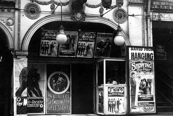 Postering gone wild at Seattle's Tivoli Theatre, ca. 1914. (Photo by Asahel Curtis, courtesy University of Washington, Special Collections, Negative No. A.Curtis29853)