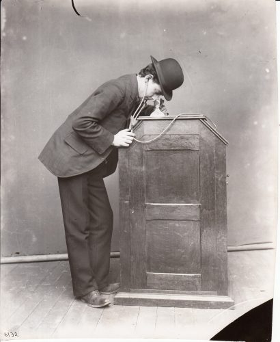 Edison kinetoscope with adaptation for sound, ca. 1895, complete with "earbuds." (Courtesy National Park Service)