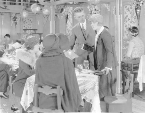 Director Woody Van Dyke with Wanda Hawley in the cabaret scene from "Eyes of the Totem." (Courtesy Tacoma Public Library, General Photograph Collection LANCE-009)
