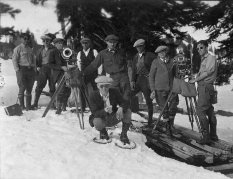 Crew for "Raw Country" on Mt. Rainier, with Woody Van Dyke kneeling on snowshoes. (Courtesy Tacoma Public Library, General Photograph Collection LANCE-053)