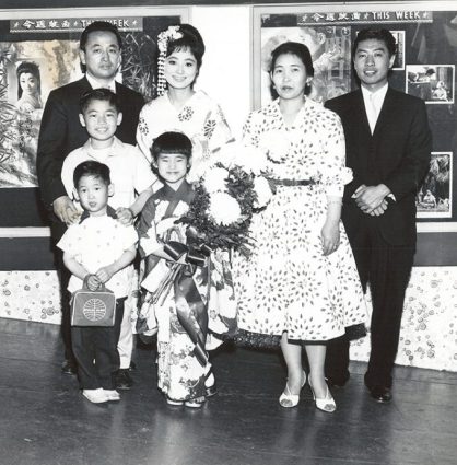 Undated photo of the Kitamura family at the Kokusai Theatre. (Courtesy Internatinal Examiner)