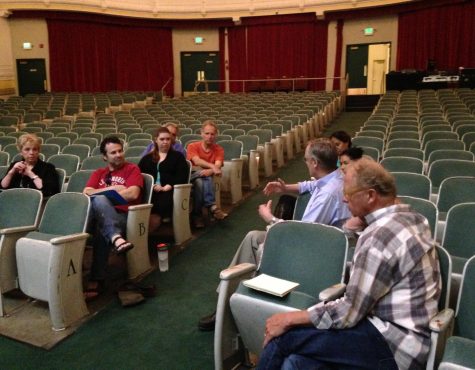 Team Totem meets at the Rialto Theatre, Tacoma, to put the final touches on the "Eyes of the Totem' re-premiere in September 2015. (Courtesy Team Totem)