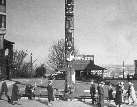 Wanda Hawley, seated, in front of the Tacoma Totem Pole in "Eyes of the Totem." (Courtesy IMDB.com)