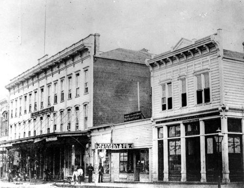 Squire's Opera House, left, on 1st Avenue in Seattle, ca. 1882. (Courtesy University of Washington Special Collections, Order No. SEA1596)