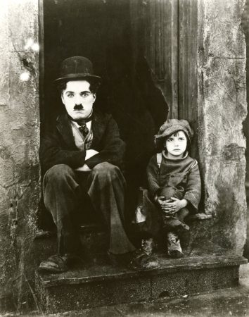 Charlie Chaplin and Jackie Coogan in "The Kid" (1921). (Courtesy University of Washington Special Collections, Order No. JWS19717)