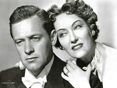 William Holden and Gloria Swanson in publicity still from "Sunset Boulevard" (Paramount, 1950).
